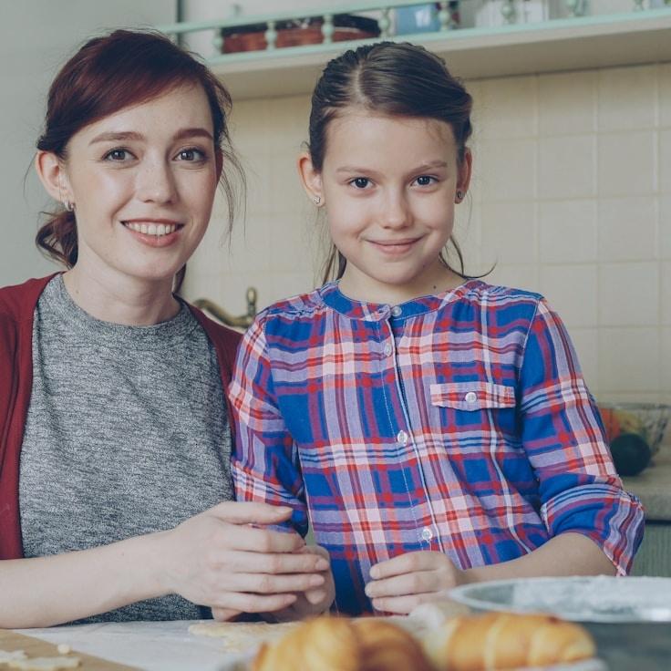 Kaveri Mehta, Lead Design Curator at Global Wellbeing Path, reviewing corporate floral arrangements